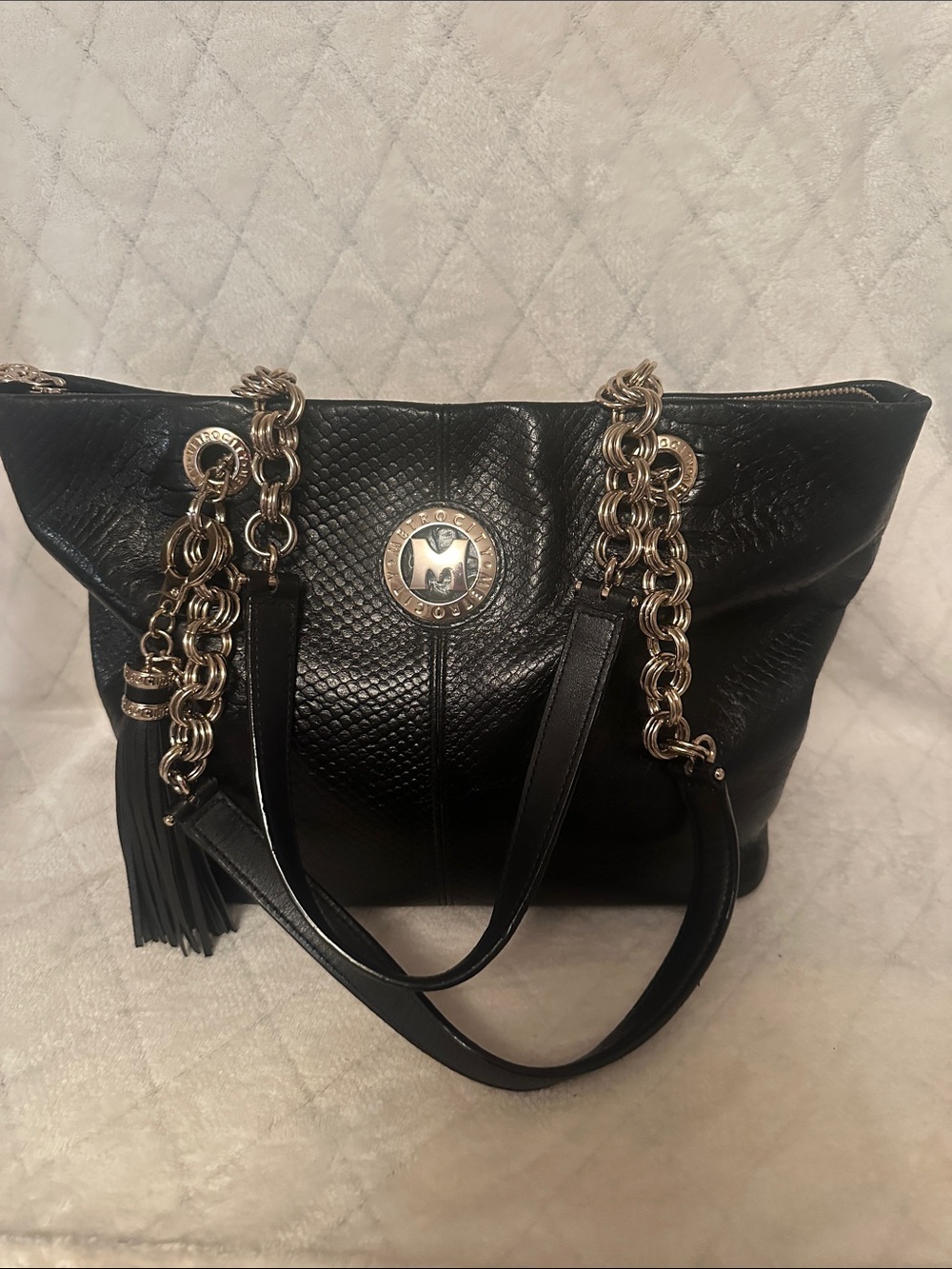 Black Leather Shoulder Tote with Gold Chain Handles and Tassel